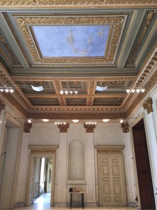 Detail of coffered decorations of the hall of gilded stucco with the marble bust of Giovanni Traversi (Photo archive ISAL)